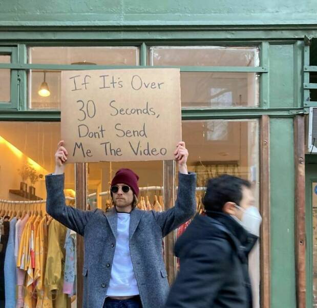 Dude With Sign” Never Stops Protesting Stuff…