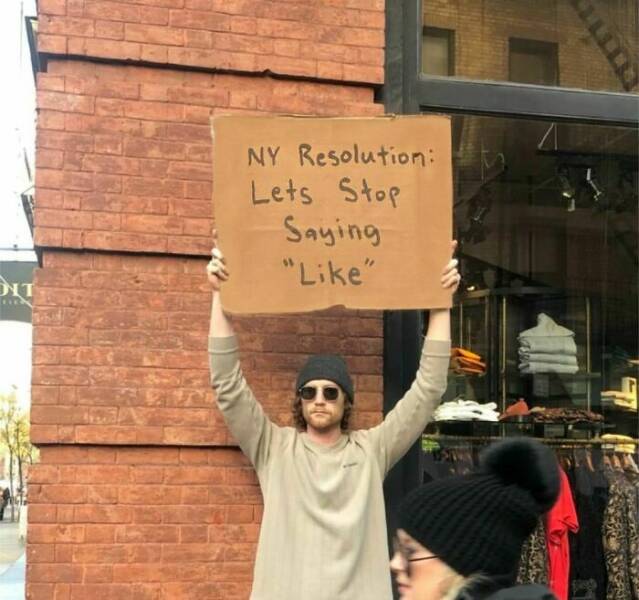 Dude With Sign” Never Stops Protesting Stuff…