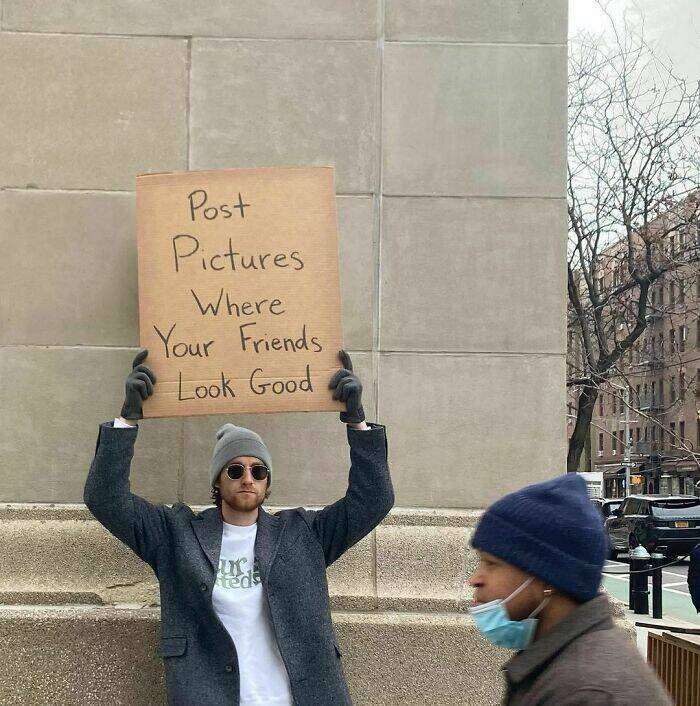 Dude With Sign” Never Stops Protesting Stuff…