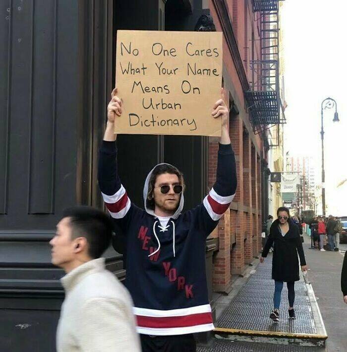 Dude With Sign” Never Stops Protesting Stuff…