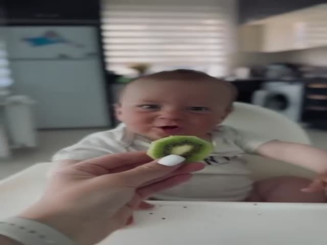 Kid Tries Kiwi For The First Time