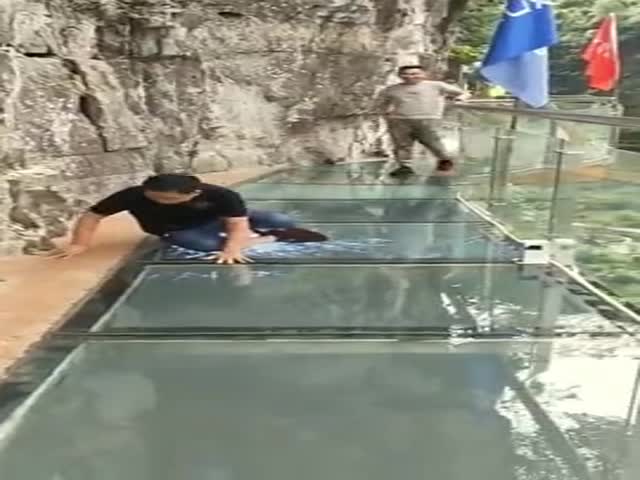 An Ordinary Glass Bridge That Tourists Love To Walk On