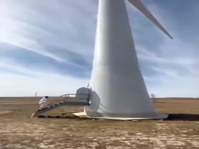 This Is How Repairmen Climb A Wind Turbine