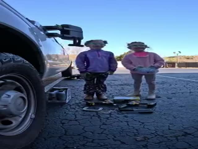 Father Teaches Daughters To Repair A Car