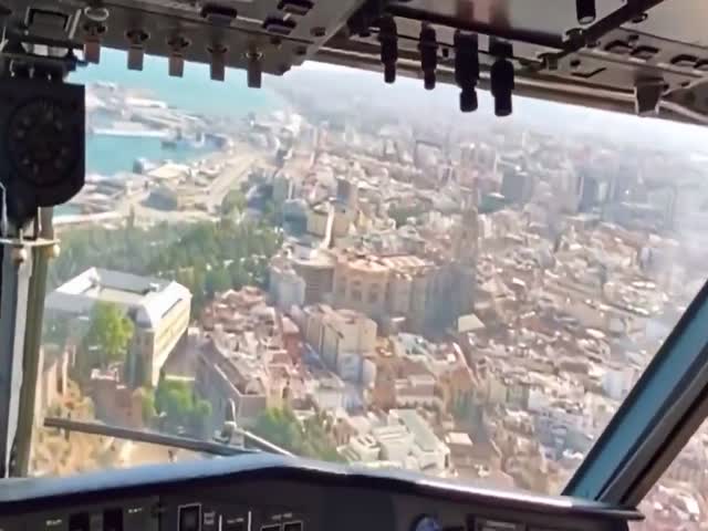 A Firefighting Plane Flies Into A Busy Harbour To Collect Water