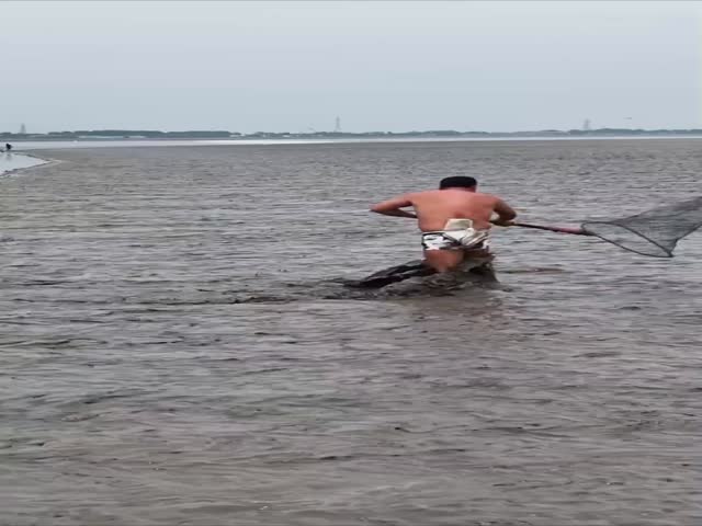 Fisherman Runs At Tide Speed On A Mirror-Flat Beach