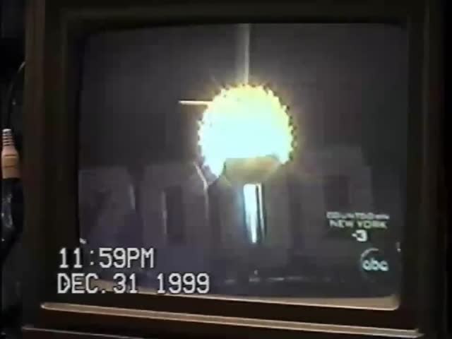 A Guy Checks His Computer On New Years Night, 2000