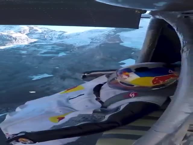 2 Wingsuit Flyers B.A.S.E Jump Into a Plane Mid-air