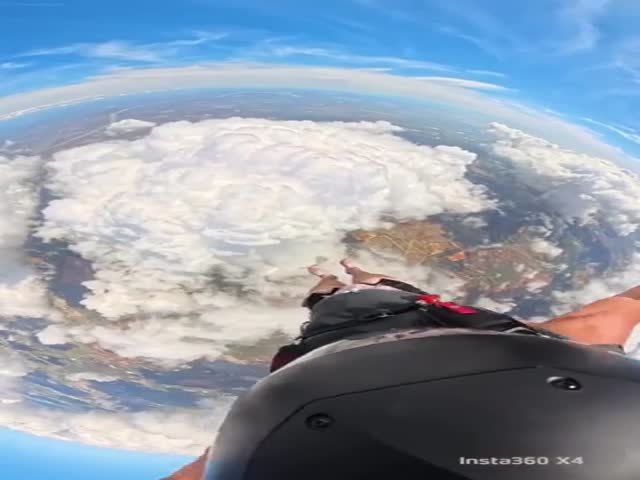 How It Looks Like To Go Through a Cloud While Skydiving