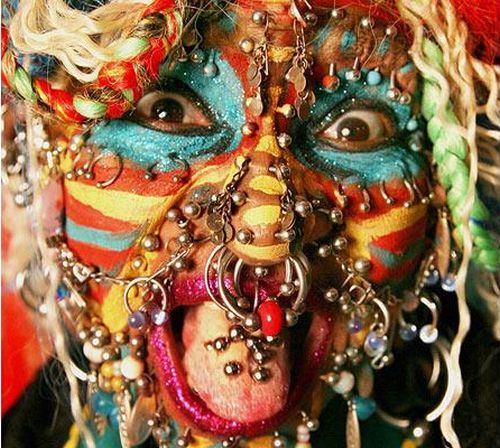Most Pierced Woman in the world (28 pics)