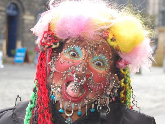 Most Pierced Woman in the world (28 pics)
