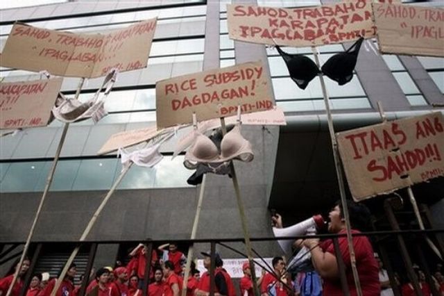 Triumph International Philippines dismissed workers throwing bras in the air to demonstrate! (14 pics)