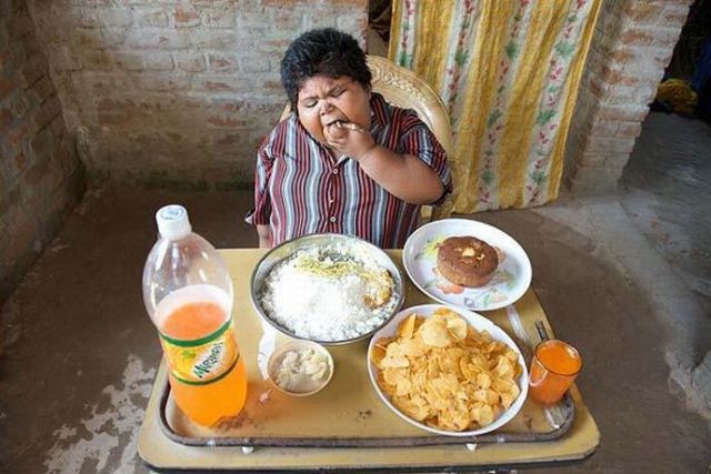 5-year-old Indian girl that eats way too much (9 pics)