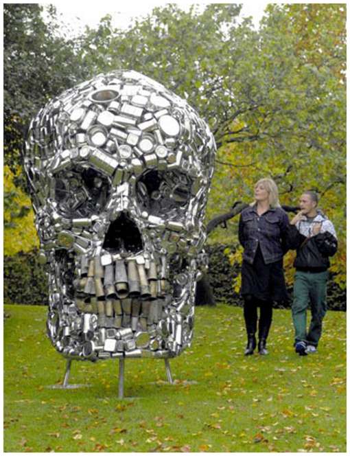 Scull sculpture made out of kitchen utensils (6 pics)