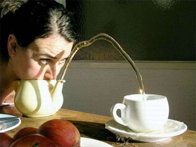 Unusual contest for blowing water out from a teapot (18 pics)