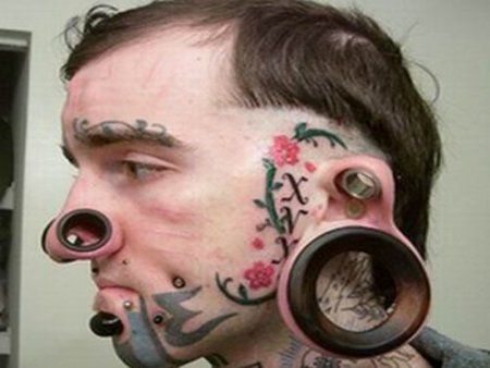 Stupid and weird body modifications (8 pics)