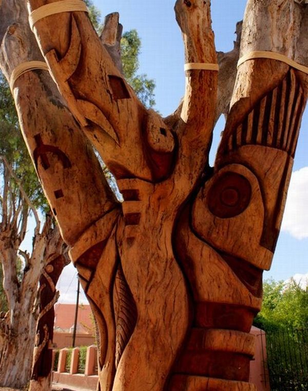 Шестнадцать деревьев. Деревянные фигуры. Скульптура из дерева. Деревянные скульптуры для сада. Необычные скульптуры из дерева.