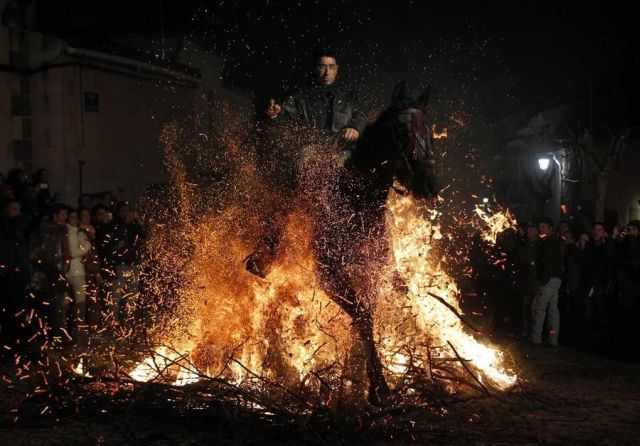 Jumping Over the Fire (9 pics)