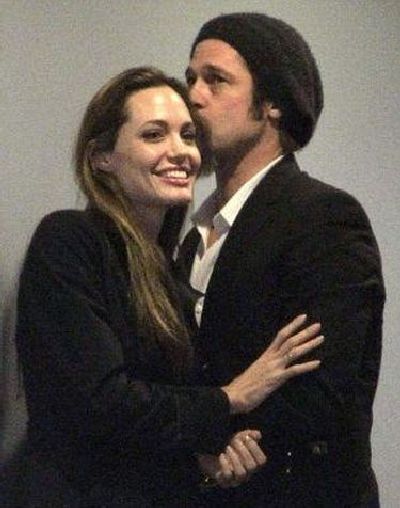 Jolie and Pitt Were Kissing on a Stadium. I Guess Rumors about Their Separation Are Just Rumors (5 pics)