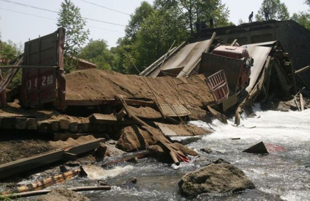 The Car Was Too Heavy for the Bridge (7 pics)