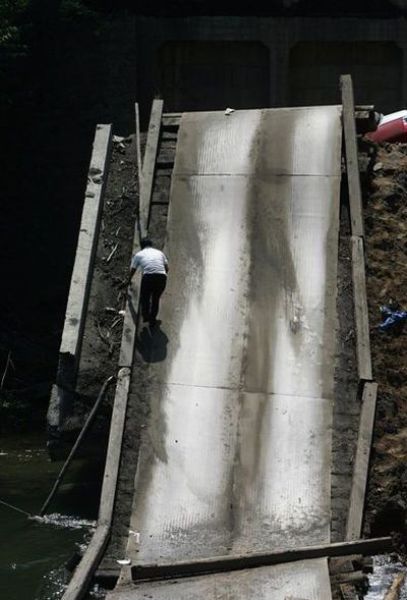 The Car Was Too Heavy for the Bridge (7 pics)