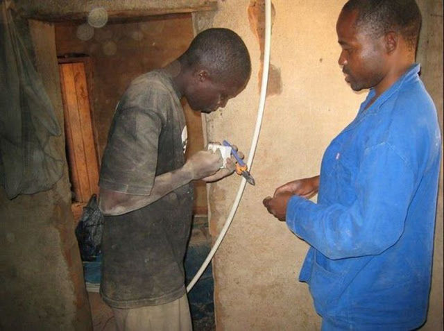 Young African Built Windmills from Garbage