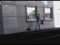 Guy Dances while Waiting for the Bus
