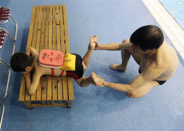Chinese Kids Learning How to Swim