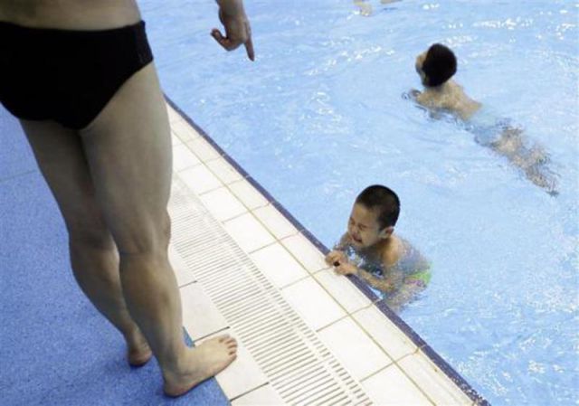 Chinese Kids Learning How to Swim