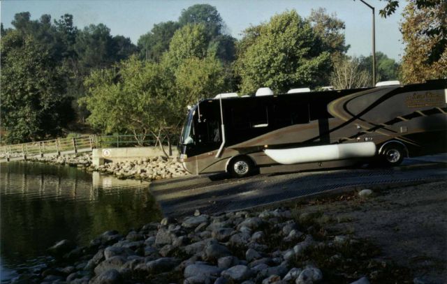 An Amazingly Luxurious Coach That Converts into a Yacht