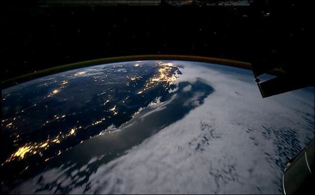 Orbiting the Planet Earth at Night [VIDEO]