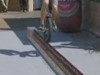 Riding a Unicycle along a Line of Beer Bottles Record