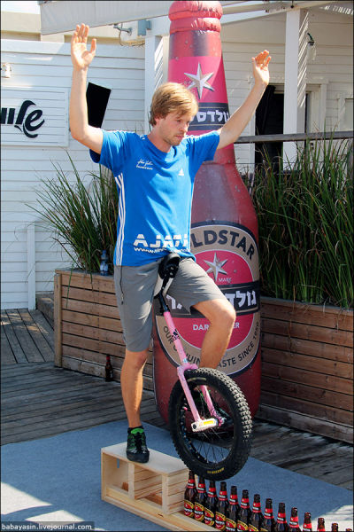 Unicyclist Sets Beer Bottle Riding World Record