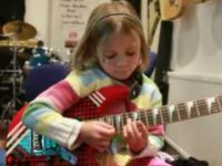 Six-Year-Old Girl Plays "Sweet Child of Mine"