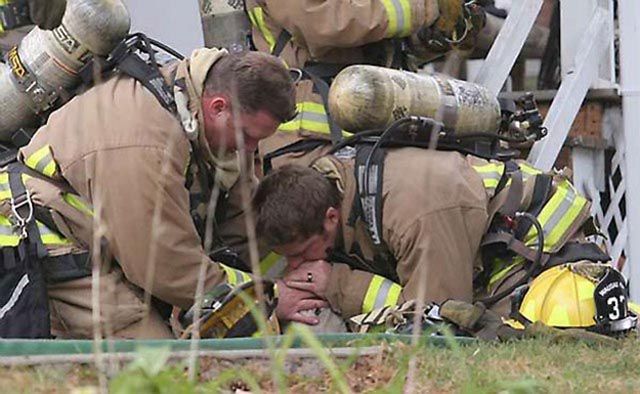 Firefighters Resuscitate Dog By Blowing in His Nose
