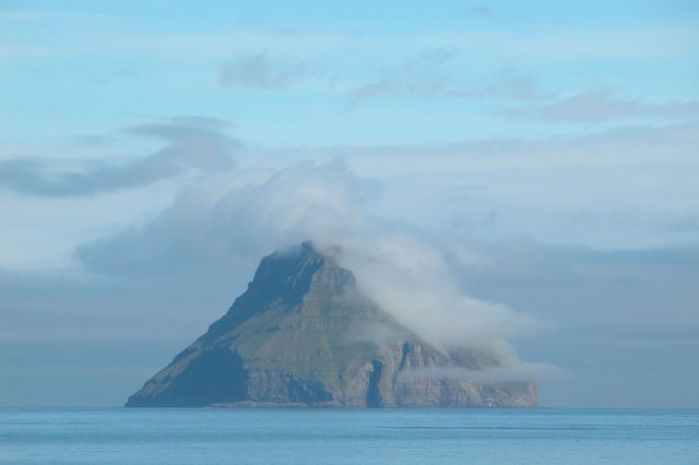 An Amazing Island with a Crown of Clouds