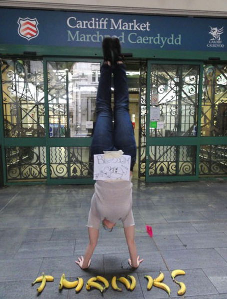Young Woman Does Handstands for Good Cause