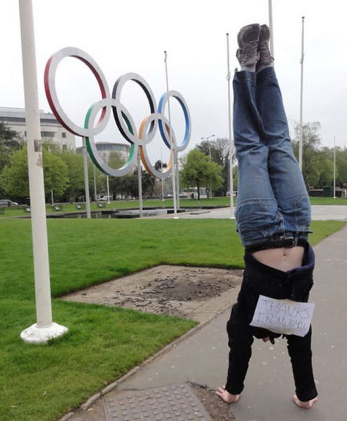 Young Woman Does Handstands for Good Cause