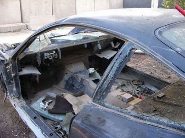 Wrecked Luxury Cars of Hussein’s Son