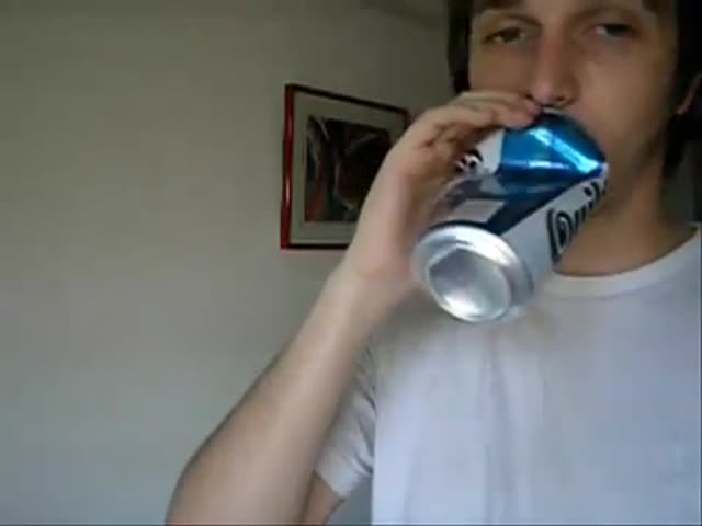 Guy Makes Awesome Supercar Engine Sounds with His Mouth and a Beer Can 