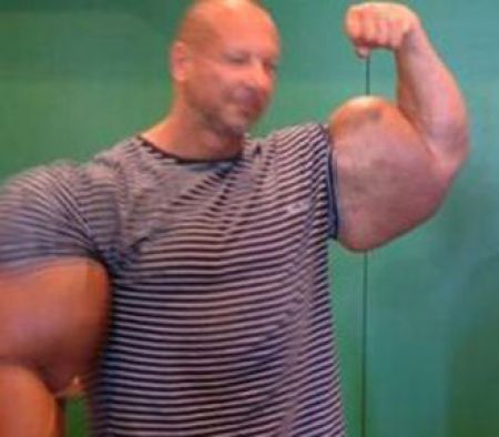 This bodybuilder totally looks like Pinhead