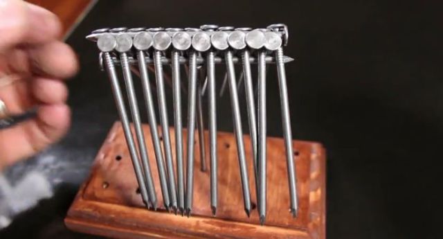 How to Balance 14 Nails on a Single Nail Head