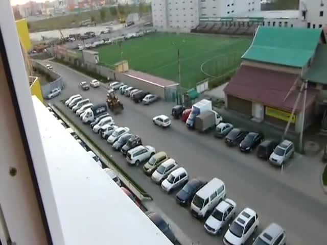 Drunk Russian Guy on Front Loader vs Cars 