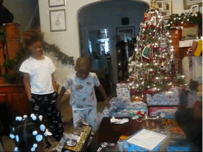 Happy and Excited Children on Christmas Morning