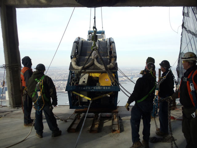 Lifting the Escalator of the 101st Floor of the WTC