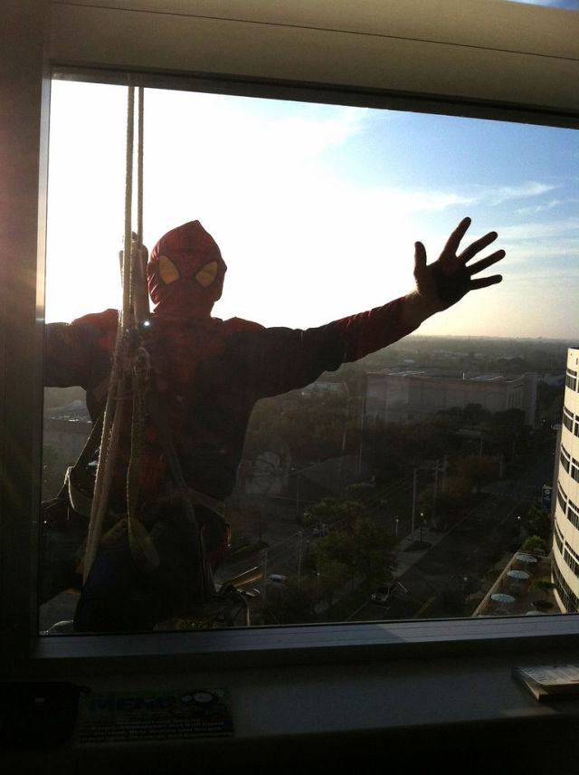 Superheroes Take Time Out to Clean Windows