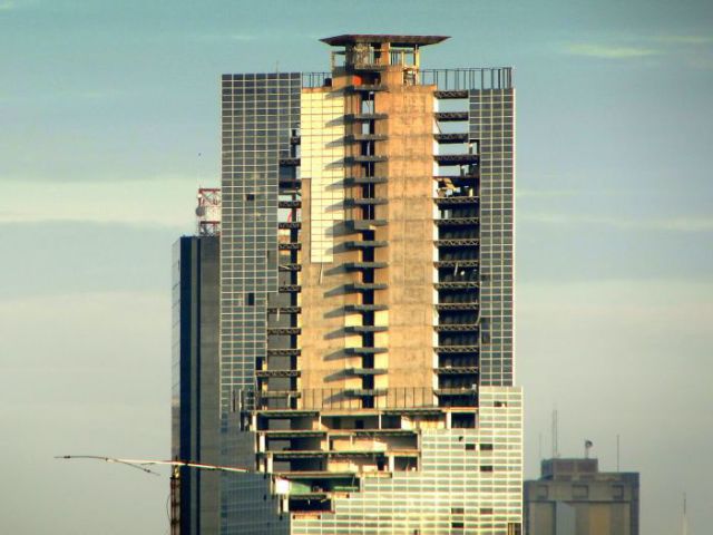 Abandoned Skyscraper Is Home to Thousands