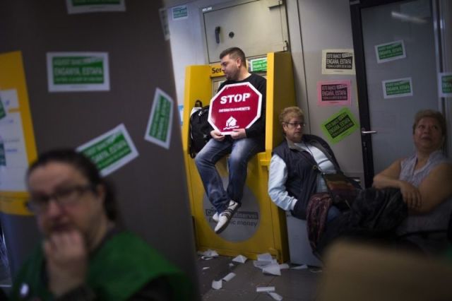 Spanish Protesters Against the Eviction Occupied a Bank Branch