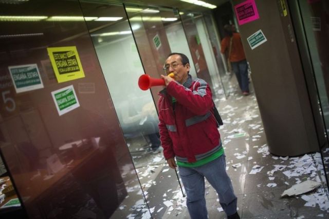 Spanish Protesters Against the Eviction Occupied a Bank Branch