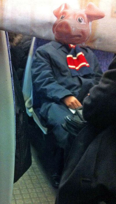 Funny Newspaper Photobombs Amuse This Bored Commuter